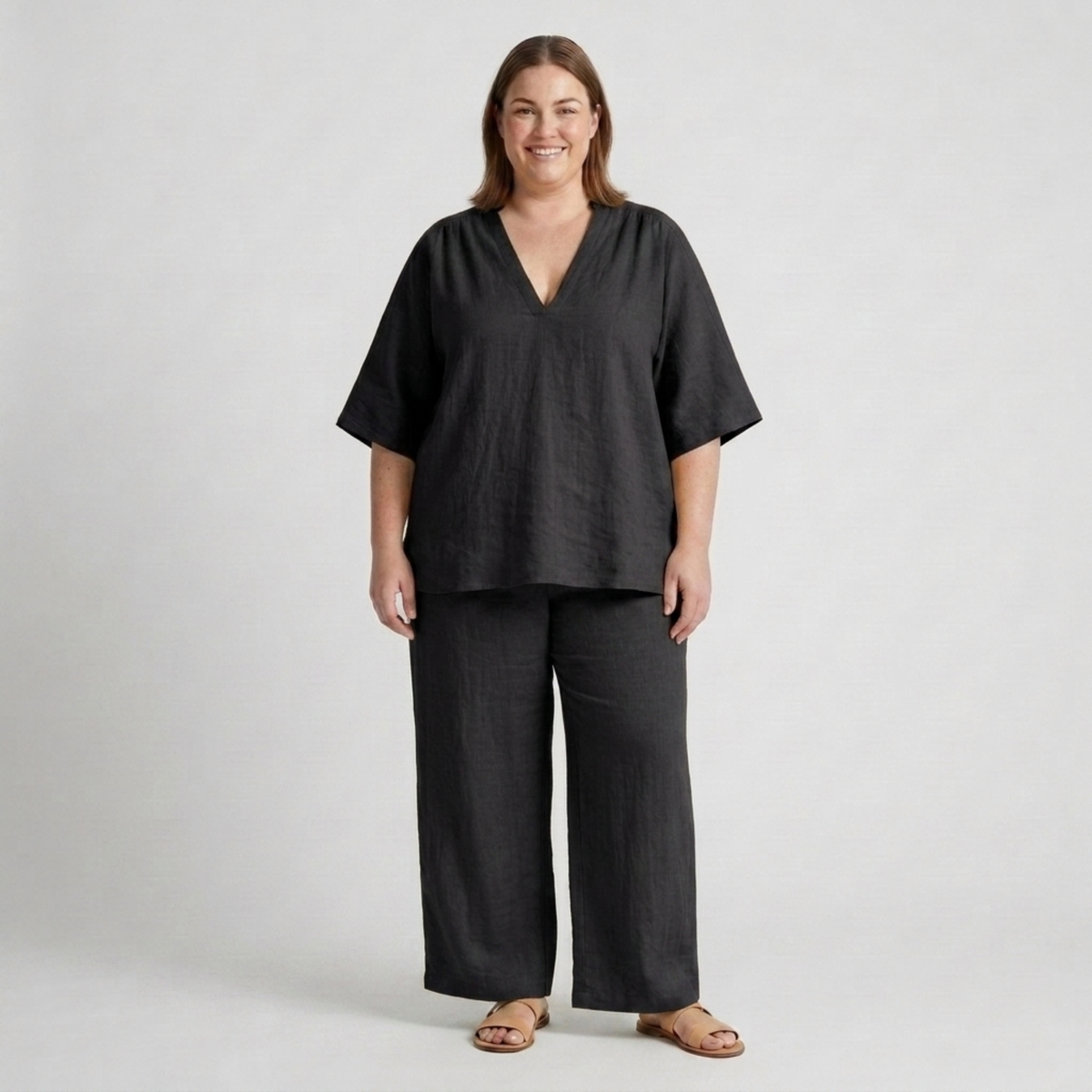 Plus size two-piece set for women with loose V-neck top and flowy pants